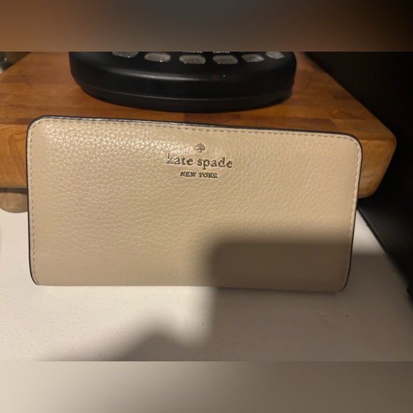kate spade Handbags - Kate Spade Beige Leather Wallet